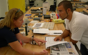 student and teacher in a classroom